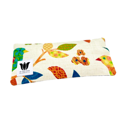 Linen eye pillow with bird and floral print in bright colors made in calgary allberta canada