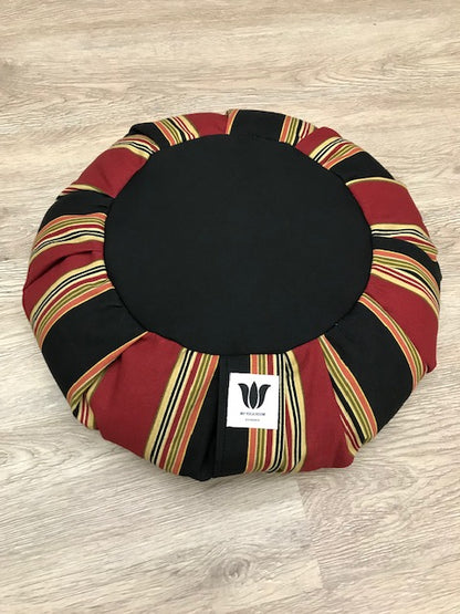 Handcrafted premium cotton canvas meditation seat cushion in red, black , gold varying width stripe. Align the spine and body in comfort to calm the monkey mind in your meditation practice. Handcrafted in Calgary, Alberta Canada