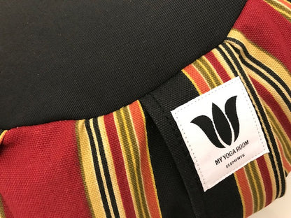 Handcrafted premium cotton canvas meditation seat cushion in red, black , gold varying width stripe. Align the spine and body in comfort to calm the monkey mind in your meditation practice. Handcrafted in Calgary, Alberta Canada