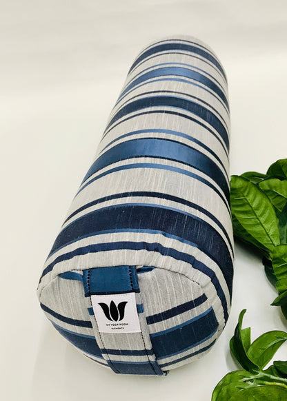 Round yoga bolster in blue and grey strip print fabric. Allergy conscious fill with removeable cover. Made in Canada by My Yoga Room Elements