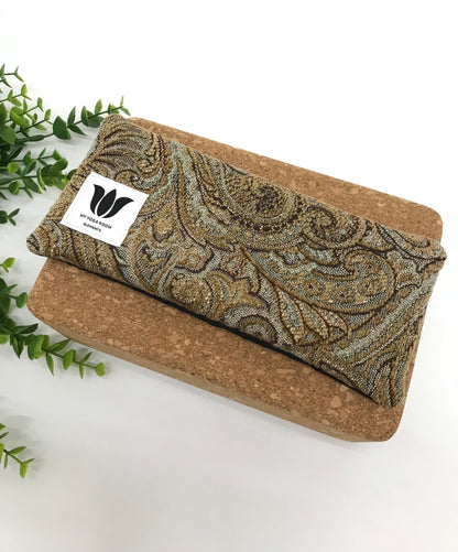 Yoga eye pillow, unscented, therapeutically weighted to soothe eye strain and stress or enhance your savasana. Handcrafted in Canada by My Yoga Room Elements. Brown plush paisley print and bamboo fabric.