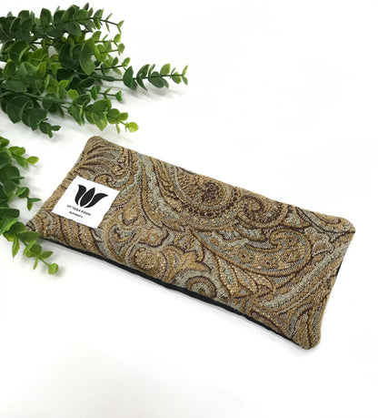 Yoga eye pillow, unscented, therapeutically weighted to soothe eye strain and stress or enhance your savasana. Handcrafted in Canada by My Yoga Room Elements. Brown plush paisley print and bamboo fabric.