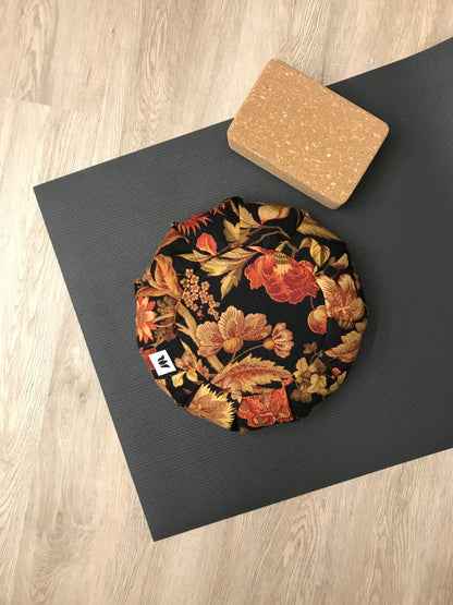 Handcrafted premium linen fabric meditation seat cushion in rich autumn colour floral print fabric.. Align the spine and body in comfort to calm the monkey mind in your meditation practice. Handcrafted in Calgary, Alberta Canada