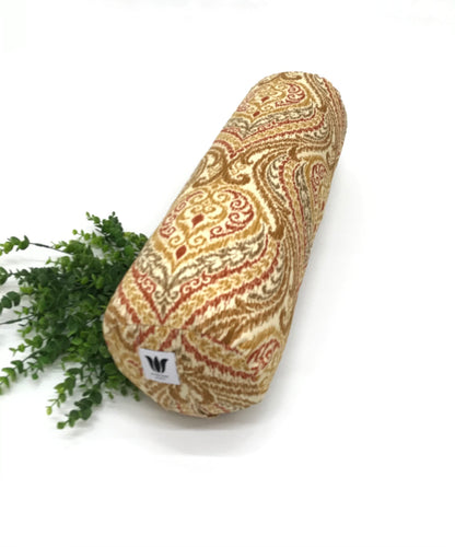 Round yoga bolster in durable cotton canvas, orange and red ikat print fabric. Allergy conscious fill with removeable cover. Made in Canada by My Yoga Room Elements