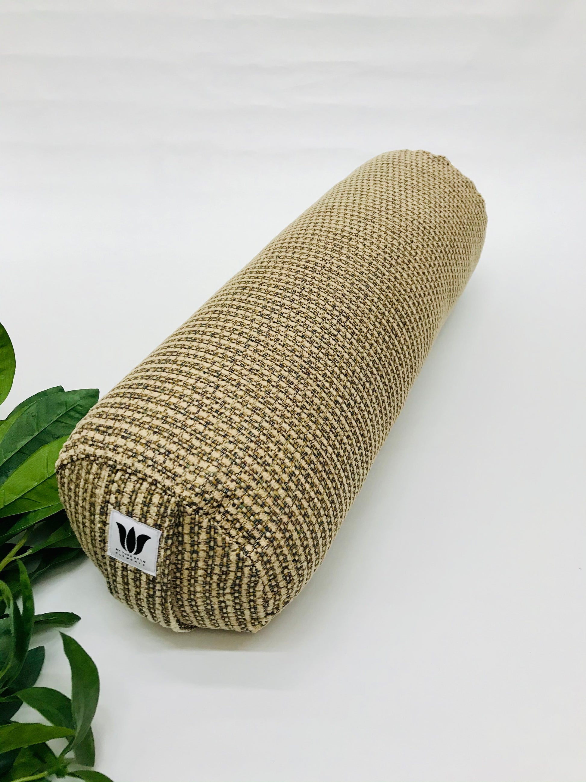 Round yoga bolster in brown durable tweed print fabric . Allergy conscious fill with removeable cover. Made in Canada by My Yoga Room Elements