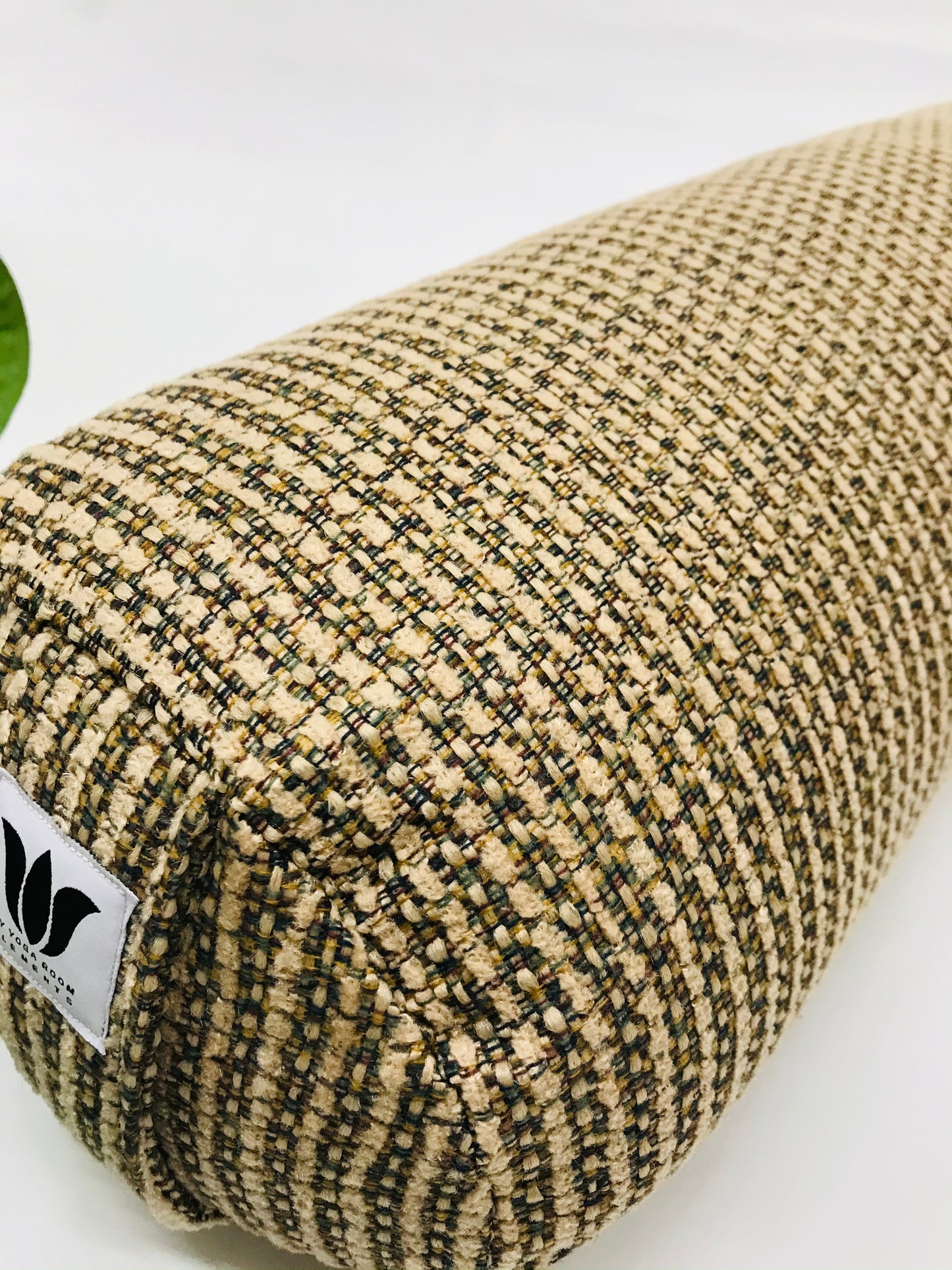 Round yoga bolster in brown durable tweed print fabric . Allergy conscious fill with removeable cover. Made in Canada by My Yoga Room Elements