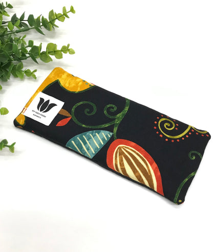 Yoga eye pillow, unscented, therapeutically weighted to soothe eye strain and stress or enhance your savasana. Handcrafted in Canada by My Yoga Room Elements. Rainbow black nature print and bamboo fabric.