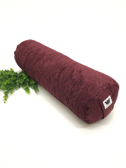 Round yoga bolster in durable plush, dark purple solid print fabric. Allergy conscious fill with removeable cover. Made in Canada by My Yoga Room Elements