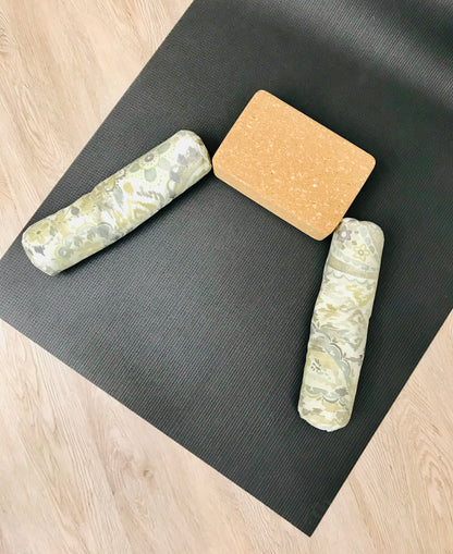 Mini yoga bolster in durable fabric, sage green paisley fabric. Cushion and support the body in the practice of yoga and meditation.Removeable cover. Made in Canada by My Yoga Room Elements