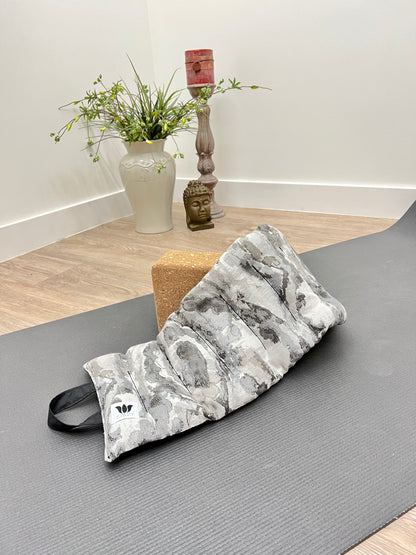 Yoga Sandbag version by My Yoga Room Elements. Add grounding to your practice with this heatable yoga prop. Handcrafted in Calgary in grey marble print fabric.