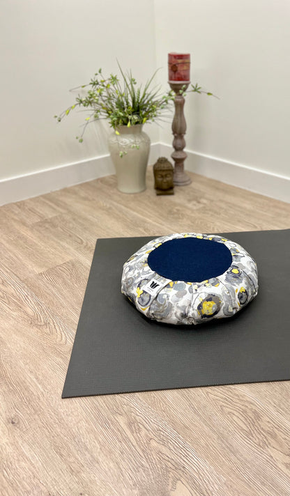 Handcrafted premium cotton canvas fabric meditation seat cushion in grey blue yellow water colour print fabric. Align the spine and body in comfort to calm the monkey mind in your meditation practice. Handcrafted in Calgary, Alberta Canada