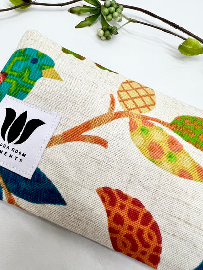 Yoga eye pillow, unscented, therapeutically weighted to soothe eye strain and stress or enhance your savasana. Handcrafted in Canada by My Yoga Room Elements. Rainbow natural print and bamboo fabric.