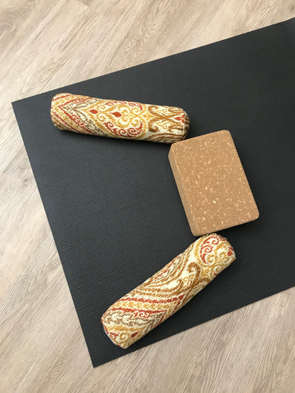 Mini yoga bolster in durable fabric, red gold beige damask print fabric. Cushion and support the body in the practice of yoga and meditation.Removeable cover. Made in Canada by My Yoga Room Elements