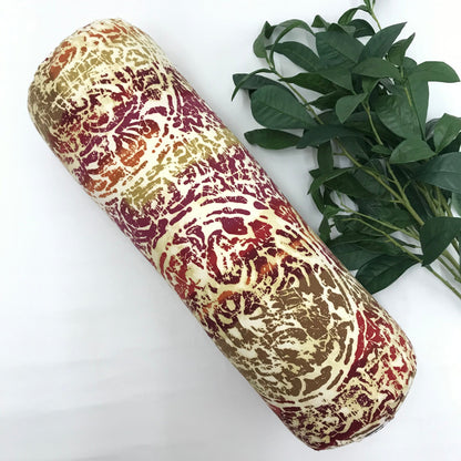 Round yoga bolster in durable cotton canvas, pink, yellow, orange, beige mottled print fabric. Allergy conscious fill with removeable cover. Made in Canada by My Yoga Room Elements