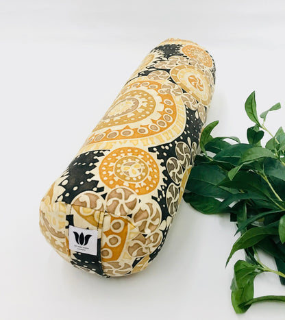 Round yoga bolster in durable cotton canvas, in black and bright colour novelty print fabric. Allergy conscious fill with removeable cover. Made in Canada by My Yoga Room Elements