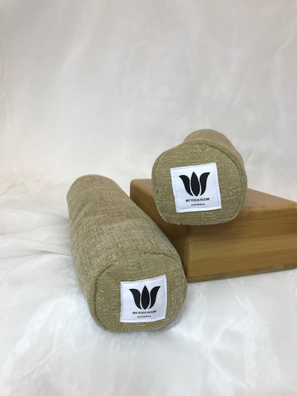 Mini yoga bolster in durable fabric, solid light brown plush fabric. Cushion and support the body in the practice of yoga and meditation.Removeable cover. Made in Canada by My Yoga Room Elements