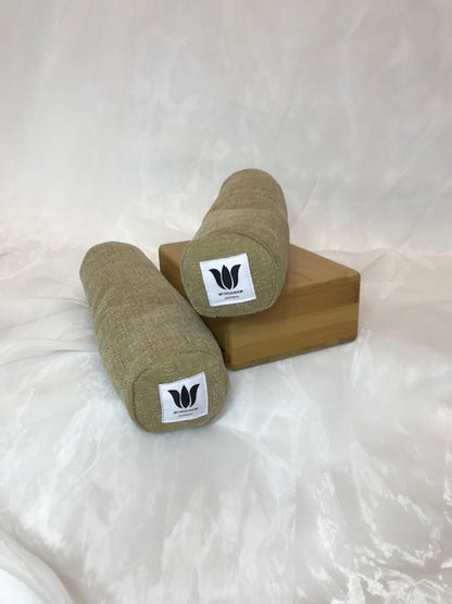 Mini yoga bolster in durable fabric, solid light brown plush fabric. Cushion and support the body in the practice of yoga and meditation.Removeable cover. Made in Canada by My Yoga Room Elements