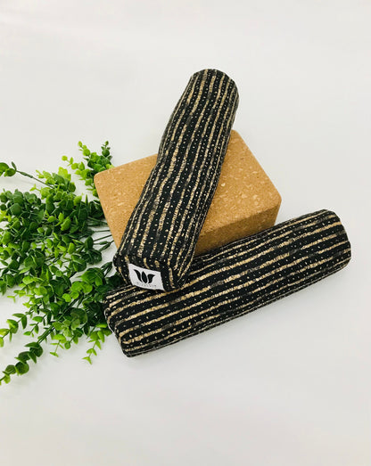 Mini yoga bolster in cotton canvas fabric, black and beige stripe fabric. Cushion and support the body in the practice of yoga and meditation.Removeable cover. Made in Canada by My Yoga Room Elements