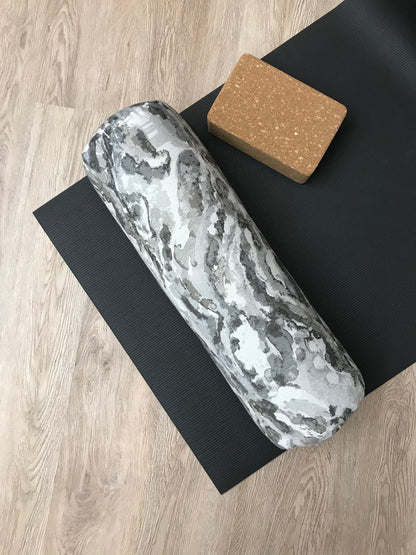 Round yoga bolster in durable cotton, grey and white marble print fabric. Allergy conscious fill with removeable cover. Made in Canada by My Yoga Room Elements